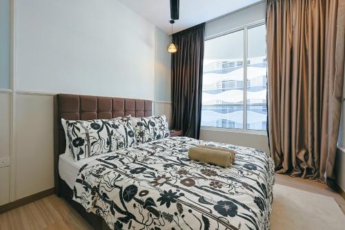 Postel nebo postele na pokoji v ubytování The Wave Residence Melaka in Malacca by Green Home