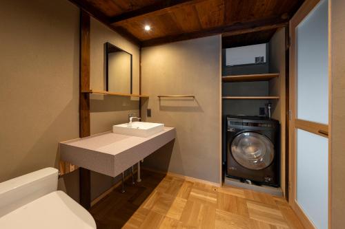 Koupelna v ubytování SAKAINOMA HOTEL 柳 Yanagi