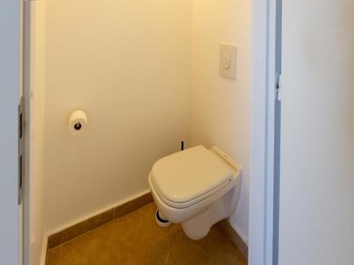 a bathroom with a white toilet in a room at Villa in Malaucène with Mont Ventoux Views in Malaucène