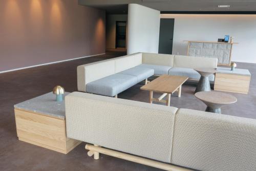 Χώρος καθιστικού στο Nature Base Hotel NUPPUKOTTE