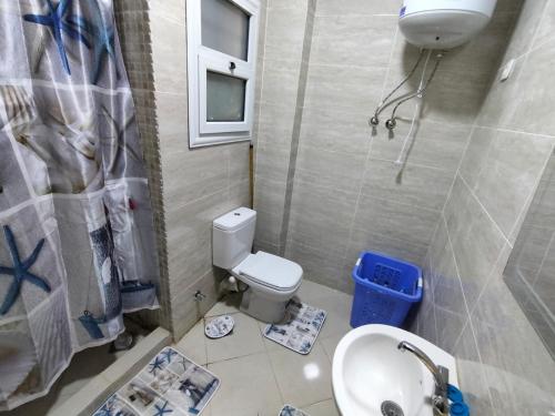 Ванная комната в Blumar El Sokhna - Deluxe Chalet شاليه ديلوكس