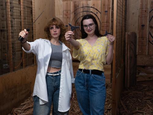two women are standing in a cell with swords at Tokyu Stay Ikebukuro in Tokyo
