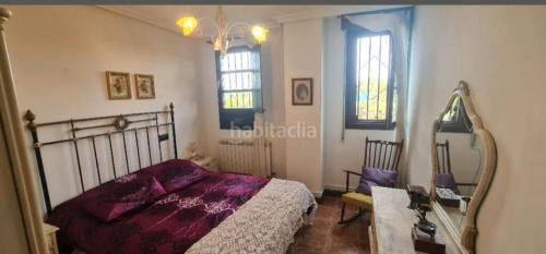 Postel nebo postele na pokoji v ubytování La Sartén