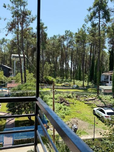 a view of a park from a balcony at Kaprovani Apartment No 9 in Ozurgetʼi