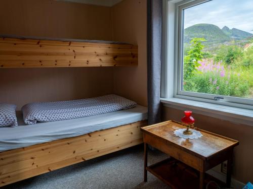 Ένα ή περισσότερα κρεβάτια σε δωμάτιο στο Moskenes Vacation Homes