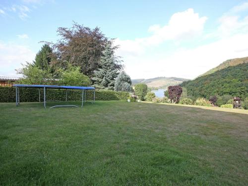 a gazebo in a field with a view of a lake at Wohnung in der Nähe des Skigebietes in Diemelsee in Diemelsee