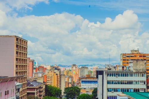 a view of a city skyline with buildings at Hotel Grand Galaxie in Caracas