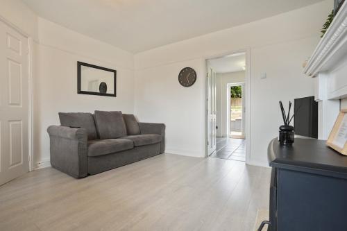 a living room with a couch and a table at poplar in Mexborough