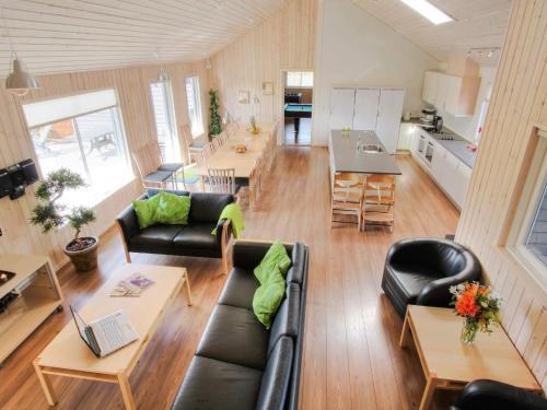 a living room with a couch and a table at Luxury Beach House - By Traum Ferienwohnungen in Bagenkop