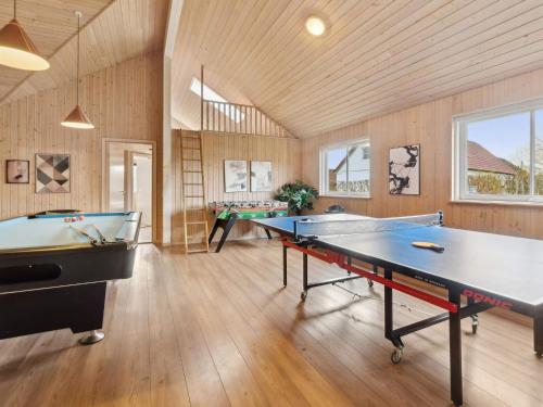 a billiard room with two ping pong tables at Luxury Beach House - By Traum Ferienwohnungen in Bagenkop