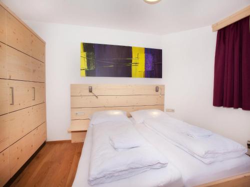 Cama o camas de una habitación en Apartment in Wald im Pinzgau with Swimming Pool and Views