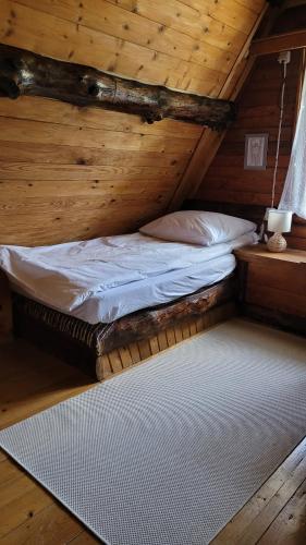 Postel nebo postele na pokoji v ubytování Wilczkiewiczówka - Bieszczadzki Azyl
