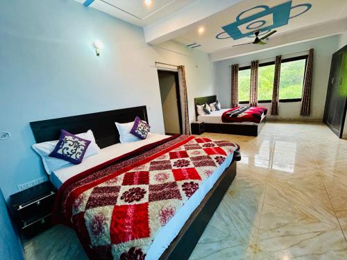 a bedroom with a bed and a couch in it at Green Valley Hotel in Lansdowne