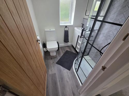 an overhead view of a bathroom with a toilet at House - Sleeps 4 - Parking - Garden - City Centre in Leeds