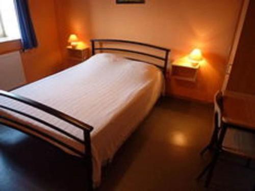 Katil atau katil-katil dalam bilik di Luxury gite with sauna in Baugnez Malmedy