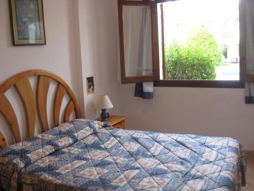 Posteľ alebo postele v izbe v ubytovaní Apartamento en Aldeas de Taray club