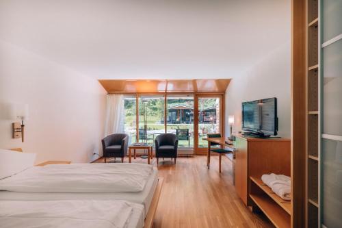 Postel nebo postele na pokoji v ubytování Hotel Schloss Ragaz