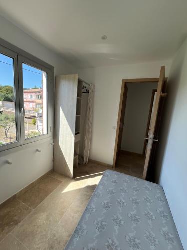 En eller flere senge i et værelse på Appartement 6