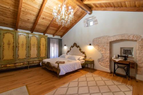 Ένα ή περισσότερα κρεβάτια σε δωμάτιο στο Casa Morosina