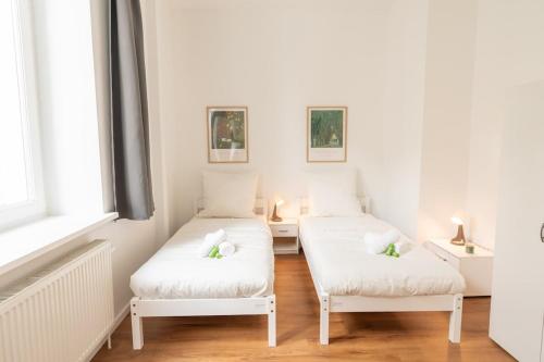 Katil atau katil-katil dalam bilik di WeserQuartier Apartment 1