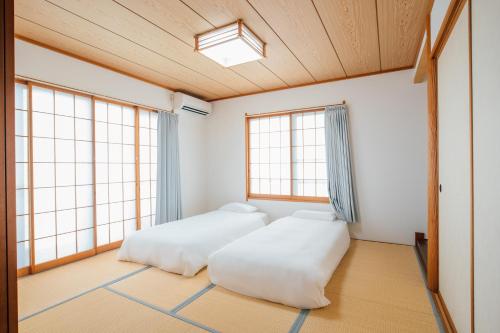 Ένα ή περισσότερα κρεβάτια σε δωμάτιο στο Bright house