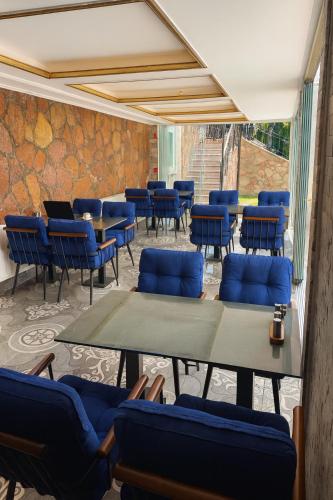 a conference room with blue chairs and a table at Reflection of the Bosphorus in Istanbul