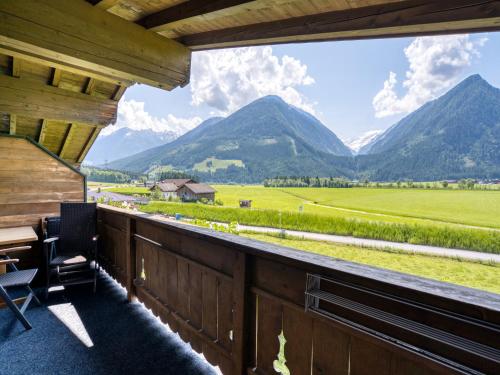 a balcony with a view of mountains at Apartment building Ferien, Neukirchen in Rosenthal