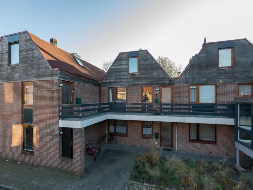 an aerial view of a brick building at Apartment in Veere near Lake Veerse Marina in Veere