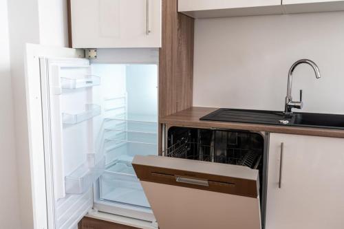 Η κουζίνα ή μικρή κουζίνα στο WeserQuartier Apartment 3