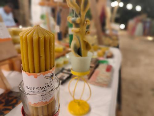 a container of french fries sitting on a table at Paje By Night Bungalows in Paje