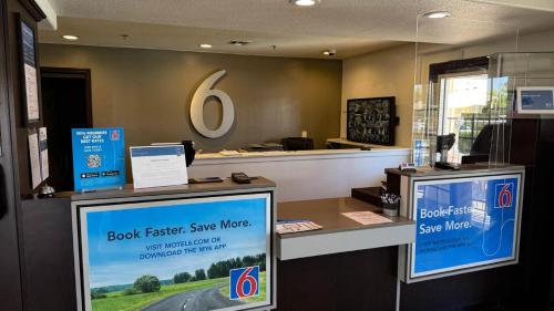 a book faster sing more counter in a store at Motel 6-Lodi, CA in Lodi
