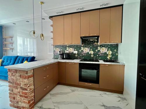 Kuchyň nebo kuchyňský kout v ubytování EASY RENT Apartments - Kompozytorów Polskich 7 Style, 24h Check-in