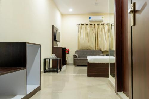 Μια τηλεόραση ή/και κέντρο ψυχαγωγίας στο Hotel Amrit Vatika