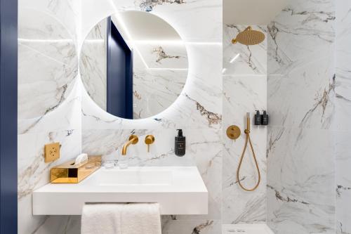 Ένα μπάνιο στο Hotel Kodawari Residences Flores