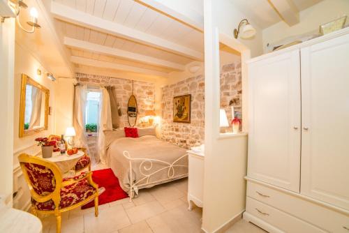 Postel nebo postele na pokoji v ubytování Villa Segalla