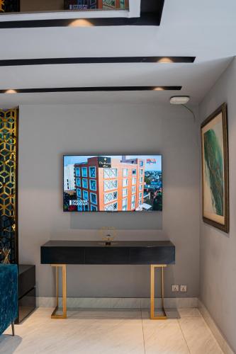 TV a/nebo společenská místnost v ubytování The Orchard Boutique Hotel