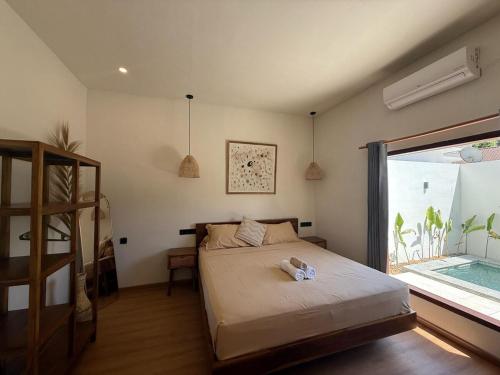 Ένα ή περισσότερα κρεβάτια σε δωμάτιο στο Villa Lulets