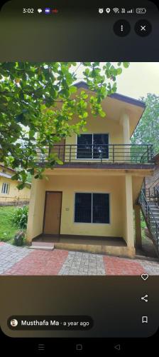 a picture of a house with at coorg Namana homestay in Suntikoppa