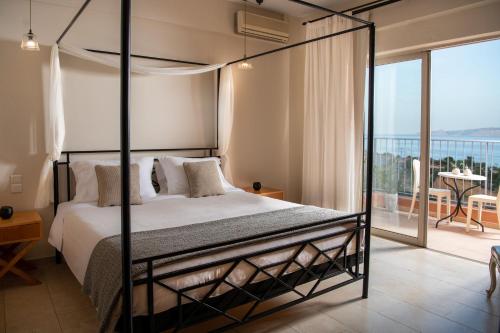 Letto o letti in una camera di Pleiades Luxurious Villas