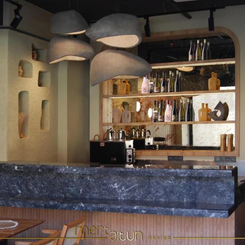 a bar in a restaurant with a counter top at Four Sides Beyoglu in Istanbul