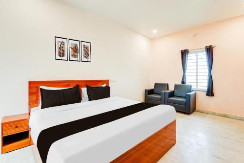 Ένα ή περισσότερα κρεβάτια σε δωμάτιο στο Super Hotel O Shine Inn
