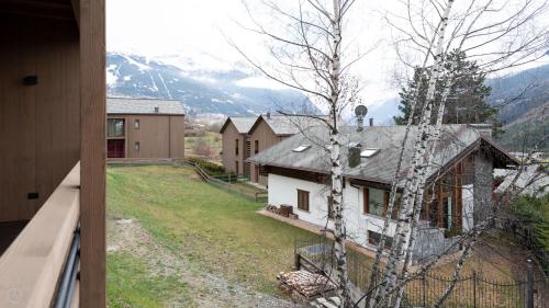a view of a house from the balcony of a house at Dosso del Grillo 1A in Valdidentro