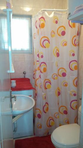Ванная комната в Arco Arina Apartment