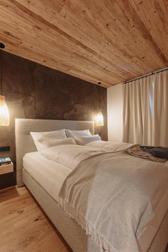 Letto o letti in una camera di grainau1 boutique apartments