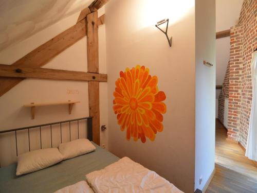 Ένα ή περισσότερα κρεβάτια σε δωμάτιο στο Teuven Farmhouse for 24 Guests