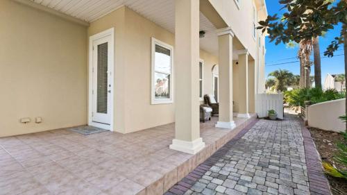 an image of a house with a patio at Three Herons Roost by Emerald Coast Retreats in Sunnyside