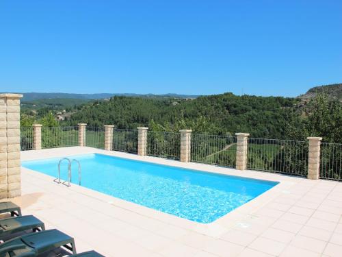 a swimming pool with a view of the mountains at Holiday Home in Toulon with Pool & Beach Nearby in Les Vans