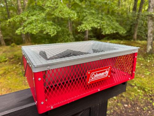 a red toaster sitting on top of a picnic table at Villa Tocca北軽井沢ヴィラ トッカ in Kita-karuizawa