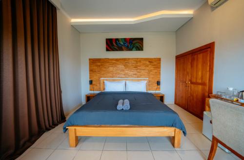 Katil atau katil-katil dalam bilik di ODA Guest House Umalas