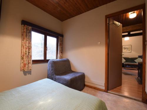 Postel nebo postele na pokoji v ubytování Forest Cottage with Ponds